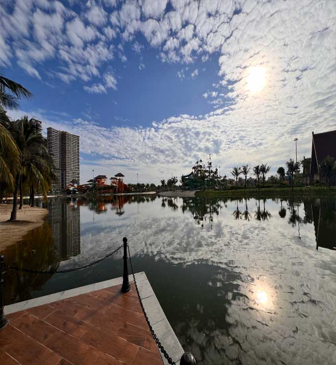 homestay-near-artificial-beach-with-sunbeds-coconut-trees-and-sunset-view-grand-park-ho-chi-minh