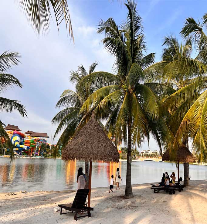 homestay-with-sunbeds-palm-trees-artificial-beach-grand-park
