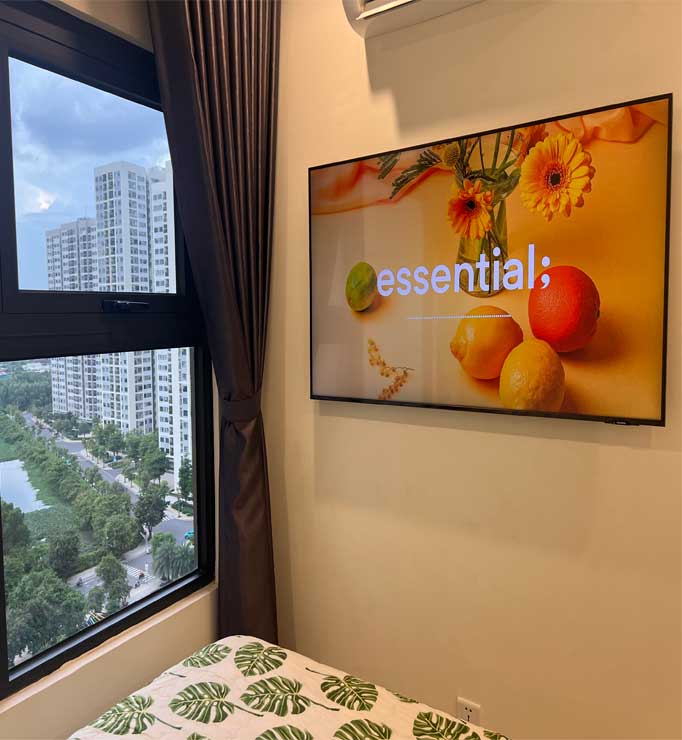 Airbnb Vinhome Grand Park phòng ngủ nhỏ ấm áp.