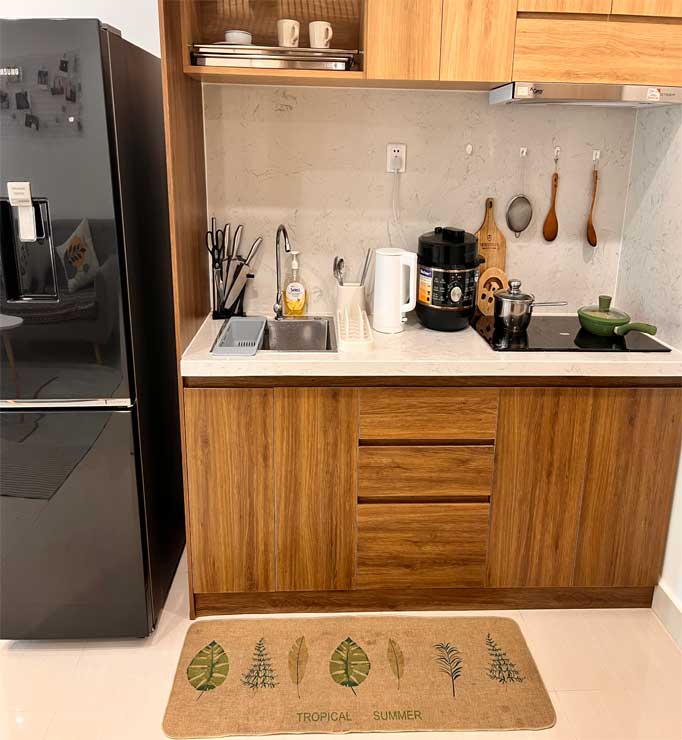 Bếp đầy đủ tiện nghi tại nhà S205, Vinhome Grand Park Homestay House, sẵn sàng cho việc tự nấu ăn